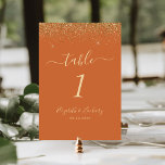 Numéro De Table Mariage de bord de Parties scintillant or orange b<br><div class="desc">Le bord supérieur de ce numéro de table mariage moderne élégant présente une conception de parties scintillant en faux or. Le texte personnalisable combine écriture manuscrite couleur or pâle,  cuivre et polices italiques sur un arrière - plan orange brûlé.</div>