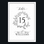 Numéro De Table Mariage de monogramme noir blanc<br><div class="desc">Nous aimons ce Blanc Noir Crest Monogram Mariage Numéro de table ! Simple, élégant et oh-so-joli, il présente une couronne feuilletée dessinée à la main encerclant un numéro de table mariage moderne. Il est personnalisé en typographie élégante, et accentué par la calligraphie lettrée à la main. Enfin, il est taillé...</div>