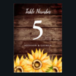 Numéro De Table Mariage de tournesol rustique<br><div class="desc">Elégant numéro de table de mariage pour votre été ou mariage de automne! Des tournesols aquarelles sur un arrière - plan en bois de grange. Utilisez cette carte de numéro de table modèle pour votre mariage à thème de pays rustique. Customisez ce produit en ajoutant vos propres noms et numéros...</div>