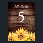Numéro De Table Mariage de tournesol rustique<br><div class="desc">Elégant numéro de table de mariage pour votre été ou mariage de automne! Des tournesols aquarelles sur un arrière - plan en bois de grange. Utilisez cette carte de numéro de table modèle pour votre mariage à thème de pays rustique. Customisez ce produit en ajoutant vos propres noms et numéros...</div>
