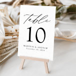 Numéro De Table Mariage d'élégance moderne blanc et noir<br><div class="desc">Cartes de numéro de table mariage tendance et minimaliste avec lettrage moderne noir avec "Table" dans script de calligraphie moderne. Le design se compose d'un arrière - plan blanc avec des taches noires subtiles pour un design unique. Le dessin se répète à l'arrière. Pour commander les cartes de table :...</div>