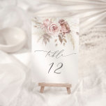 Numéro De Table Mariage floral rose pâle Rose<br><div class="desc">Entrez dans un royaume d'élégance intemporelle et murissez des promesses avec notre article exquis, où la délicate beauté des pétales roses poussiéreux se mêle à l'allure douce des fleurs pastel. Ce design captivant incarne l'essence de la romance et du raffinement, avec des botaniques broussailleuses et muettes délicatement arrangées pour évoquer...</div>