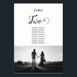 Numéro De Table Mariage photo en noir et blanc Numéro de tableau<br><div class="desc">Un magnifique script de calligraphie blanc et noir présentant la photo du couple. Un design photo mariage moderne avec des éléments minimalistes simples. Un design de numéro de table moderne mariage idéal pour toute personne qui aime la calligraphie script, les conceptions noir et blanc et la papeterie photo mariage. Des...</div>