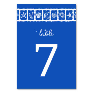 Numéro De Table Mariage sur la plage avec grille de coquillages bl