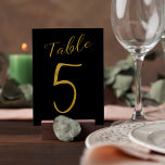 Numéro De Table Mariage table numéro or parties scintillant noir é<br><div class="desc">Faux or feuille de calligraphie formelle script mariage carte de table de réception de mariage. La couleur noire de l'arrière - plan est modifiable. Vous pouvez le modifier après avoir appuyé sur le bouton PERSONNALISER. Vous pouvez trouver toute la gamme de numéros (1 - 50) ici : http://bit.ly/2sLMaFh Si vous...</div>