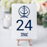 Numéro De Table Monogramme Mariage bleu marine<br><div class="desc">Chaque carte de numéro de table doit être customisée via "Personnalisez-la" et ajoutée individuellement au panier. La carte de numéro de table bleu et blanc marine à thème nautique comprend un monogramme d'ancre et des détails de corde et un motif à bande horizontale à l'arrière.</div>