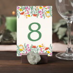 Numéro De Table Wildflower Botanical Wedding Table Number Card<br><div class="desc">Guide guests to their tables with this elegant wildflower wedding table number card. Framed with delicate garden florals and fresh greenery, this design brings a romantic botanical touch to your reception tables while maintaining a clean and timeless layout. Colorful wildflowers and soft greenery create a natural floral border that feels...</div>