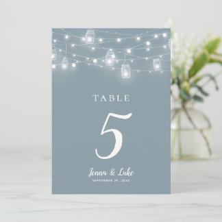 Numéros de table de mariage avec guirlandes rustiq