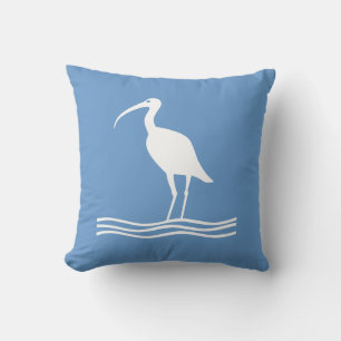 OISEAU DE MER. BLANC sur coussin bleu turquoise