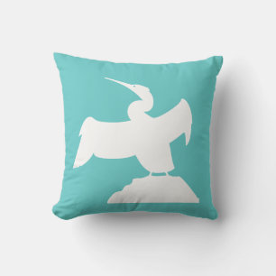 OISEAU DE MER. BLANC sur coussin bleu turquoise