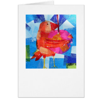 Oiseau tenant une baie