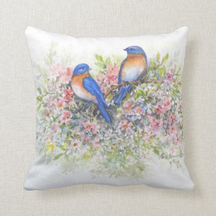 Oiseaux bleus et coussin de fleurs