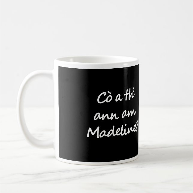 One side of the mug says Cò a th' ann am Madeline? (Gauche)