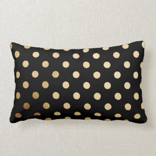 Or et coussin noir de point de polka