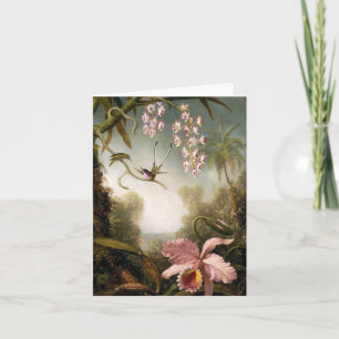 Orchidées de jet avec la carte de note de colibri