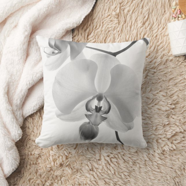 Orchidées noires et blanches sur le Coussin de pie (Couverture)