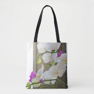 Orchidées sur un sac fourre-tout imprimé