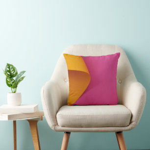Oreiller à motif géométrique rose et jaune