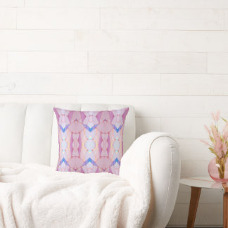 Oreiller accentué en mosaïque rose et bleu pastel