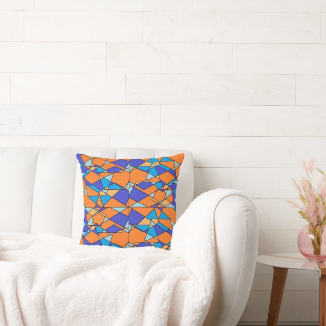 Oreiller bleu et orange avec motif géométrique (Canapé)