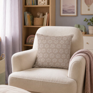 Oreiller couleur bois de rose avec petit motif bla