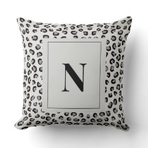 Oreiller de jet élégant avec monogramme et imprimé