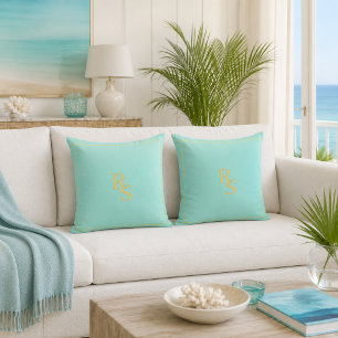 Oreiller de jet en bleu aqua doré avec monogramme