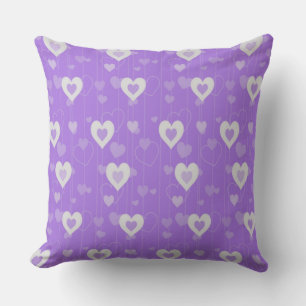 Oreiller décoratif à motif de cœurs violets et bla