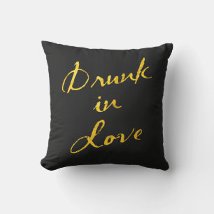 Oreiller extérieur or et noir « Ivre d'amour »