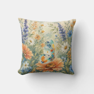 Oreiller extérieur papillon parmi les fleurs sauva