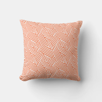 Oreiller jeté motif géométrique corail