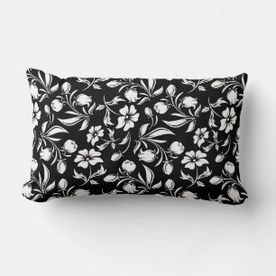 Oreiller noir et blanc à motif floral
