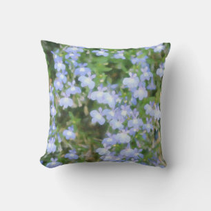 Oreillers à jet bleu et bleu floral