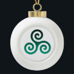 Ornement acrylique<br><div class="desc">Symbole vert Triskele. Le symbole Triskele ou Triskelion se compose de trois spirales ou de trois bras enclenchés,  comme s'il se déplaçait de son centre. Ce symbole celtique de mouvement ou d'action représente les trois mondes : céleste,  physique et spirituel.</div>