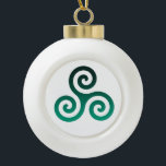 Ornement acrylique<br><div class="desc">Symbole vert Triskele. Le symbole Triskele ou Triskelion se compose de trois spirales ou de trois bras enclenchés,  comme s'il se déplaçait de son centre. Ce symbole celtique de mouvement ou d'action représente les trois mondes : céleste,  physique et spirituel.</div>