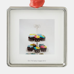Ornement Carré Argenté Petits gâteaux de chocolat sur un support de