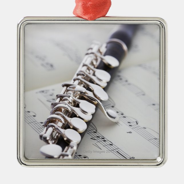 Ornement Carré Argenté Piccolo sur un score (Devant)