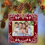 Ornement En Céramique 2 Photos Famille Végétation d'hiver Rouge Noël<br><div class="desc">Cette décoration de Noël rouge foncé présente une élégante illustration de verdure d'hiver blanche qui encadre la photo horizontale. Le design offre de l'espace pour 2 photos,  l'une devant et l'autre à l'arrière. Personnalisez ce joli ornement de conservation avec votre nom de famille et l'année.</div>