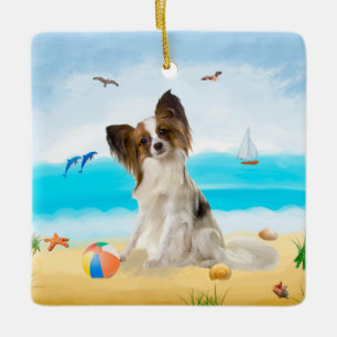 Ornement En Céramique Chien de Papillon sur la plage