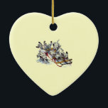 Ornement En Céramique Dalmatian Pups Sledding<br><div class="desc">Playful Dalmatian puppies sledding in the winter snow.</div>