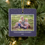 Ornement En Céramique Famille Photo Keepsaké Neige Violet Noël<br><div class="desc">Cet ornement de Noël carré présente une photo horizontale sur un arrière - plan violet foncé accentué d'un graphique de neige légère. Personnalisez cet ornement familial avec votre nom et votre année.</div>