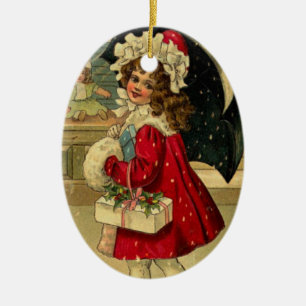 Ornement En Céramique Fille portant un cadeau de Noël