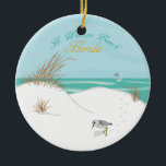 Ornement En Céramique Ft. Walton Beach (Floride)<br><div class="desc">Ce design présente l'une des plus belles plages de Floride situées sur la côte du golfe ! Un dauphin saute au-dessus des vagues dans l'arrière - plan et un oiseau de rivage feuille les pieds dans le sable blanc. Ce design peut être customisé ou personnalisé.</div>