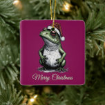 Ornement En Céramique Grenouille de Noël Cottagecore Vintage victorien<br><div class="desc">Laissez-vous séduire par le charme fantaisiste de Noël grâce à cette adorable conception de grenouilles inspirée du cottage. Evoquant le charme nostalgique des illustrations vintages,  cet amphibien attachant possède un casquette rouge festif et une écharpe verte douillette,  prête à répandre la joie des fêtes.</div>