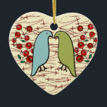Ornement En Céramique I Love Winter Birds and Berries Personnalisé<br><div class="desc">Cet ornement en céramique en forme de coeur fantaisiste est orné de la peinture digitale originale de HoMeArt avec 2 oiseaux verts bleu oeuf et avocat de robin se regardant aimablement de leur perche sur des branches minces filées couvertes de sprigs de baies rouges de canneberge juteuses sur un arrière...</div>