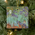 Ornement En Céramique Irises par Vincent van Gogh<br><div class="desc">Irises (1889) de Van Gogh est un post impressionnisme vintage de peinture de nature fleurie d'art. Un groupe d'iris à barbe violet et une seule fleur d'iris blanc poussent dans un jardin. C'était l'une de ses premières peintures alors qu'il était à l'asile à Saint-Rémy-de-Provence. En 1987, il est devenu le...</div>