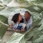 Ornement En Céramique Joy Script | Photo<br><div class="desc">Simple and elegant holiday ornament features a photo on each side with "joy" overlaid in white script lettering. Personalized with the year or your family name beneath.</div>