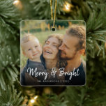 Ornement En Céramique Joyeux et lumineux | Joyeuse photo de Noël familia<br><div class="desc">Un joyeux décontracté moderne et élégant et ornement lumineux avec une belle photo de votre famille,  une police de calligraphie script décontracté de "Joyeux et lumineux" avec votre nom de famille sous. Photo de placement de Nataliya Vetkevich de Pexels. Veuillez le remplacer par le vôtre.</div>