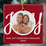 Ornement En Céramique Our 1st Christmas Engaged Photo Red Keepsake<br><div class="desc">This keepsake First Christmas Engaged photo ornament is decorated with the word JOY in stylish script typography on a red background. Easily customizable.</div>