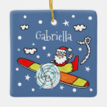 Ornement En Céramique Père personnalisé Noël Père Noël Père Noël Avion<br><div class="desc">Cette merveilleuse illustration de Helen McCartney Designs présente le Père Noël volant dans un avion coloré.</div>